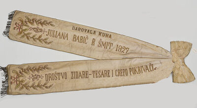 Zastavna vrpca uz zastavu Društva zidara, tesara i crijepopokrivača - Donji grad